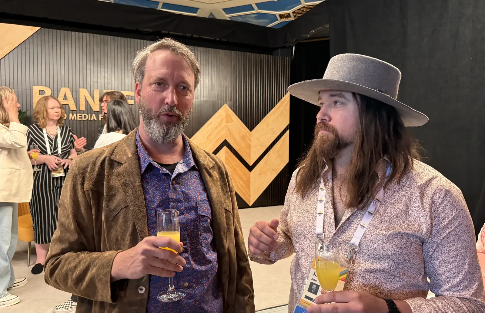 James Alton speaking with another delegate at Banff World Media Festival 2024