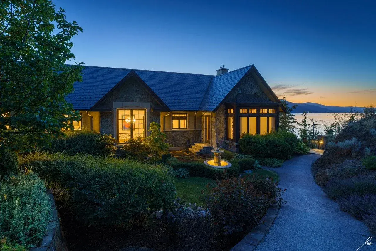 Chateau Okanagan exterior above Okanagan Lake at dusk