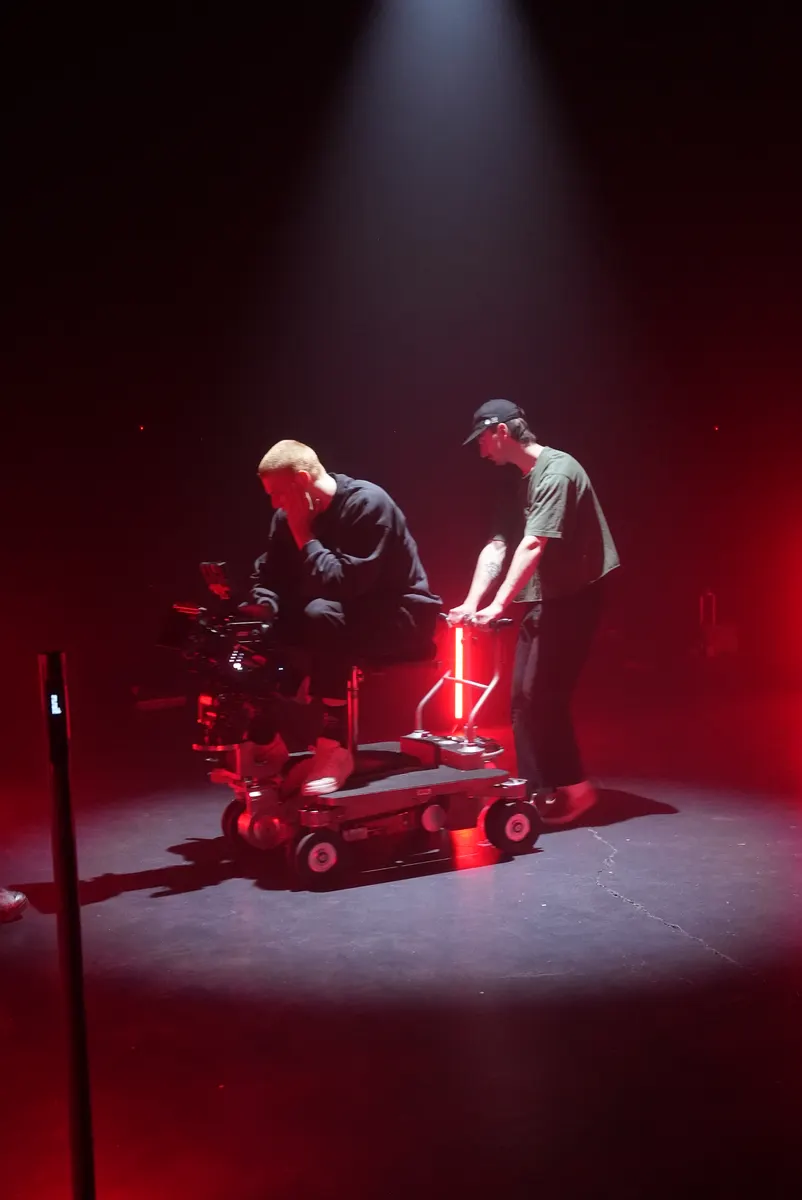 Camera team working on a red-lit dolly shot for The Keepers