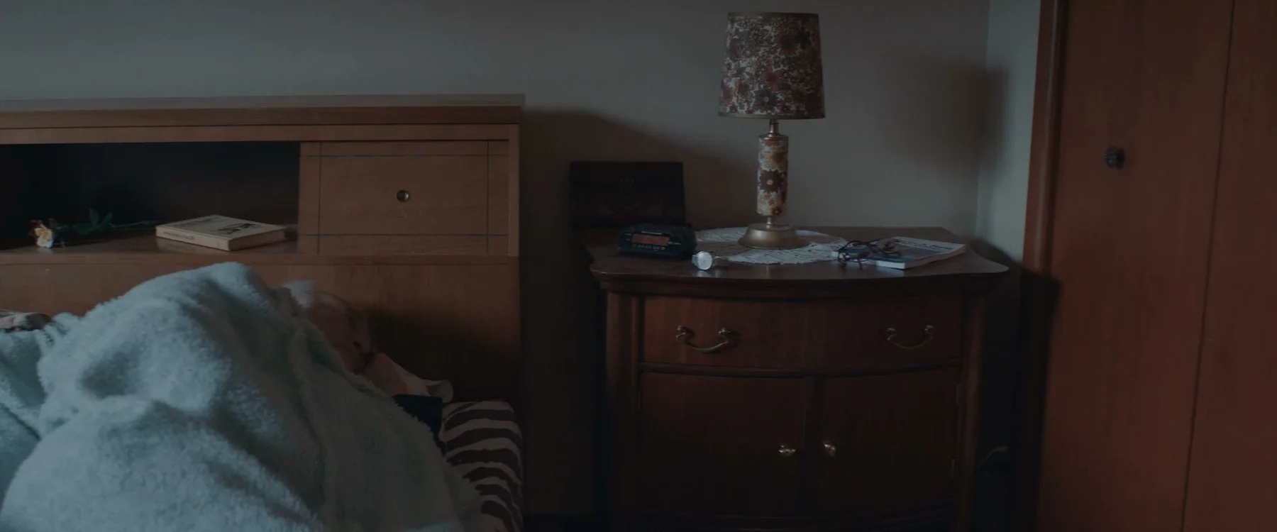 Quiet bedroom with a dresser and vase in Mabel