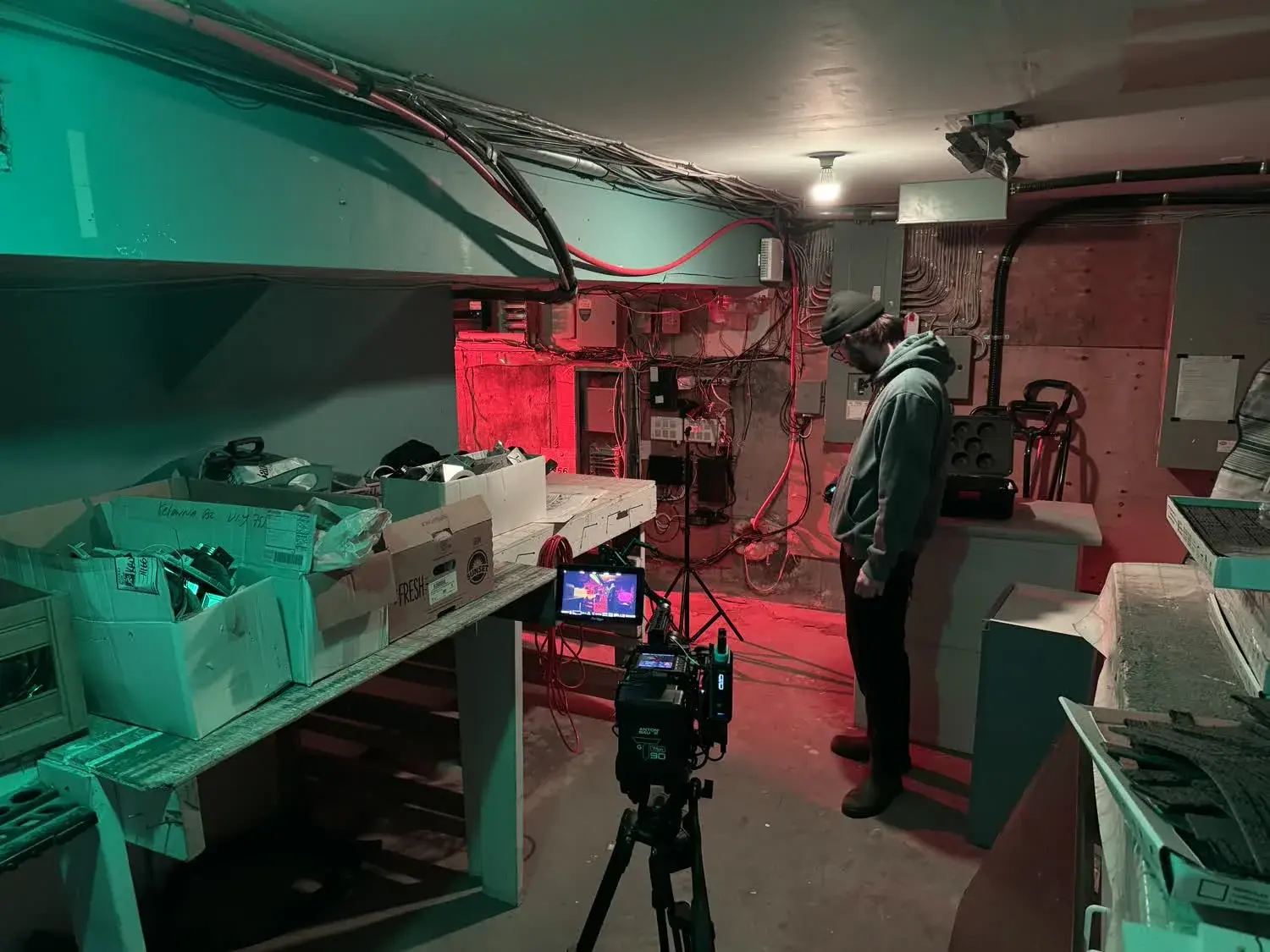 Camera and lighting setup inside a basement scene for Midlife Shuffle