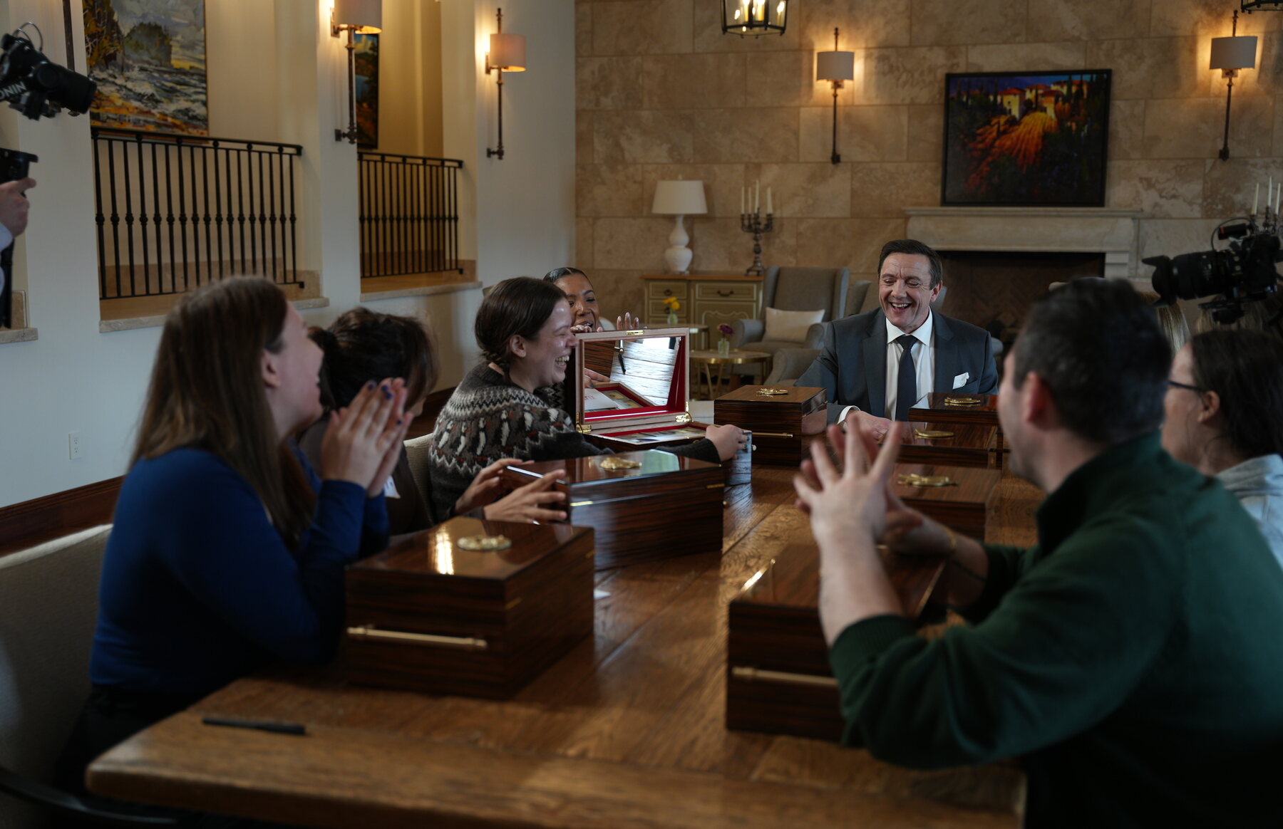 Peter Serafinowicz and Million Dollar Secret contestants at a Chateau Okanagan press and EPK table setup