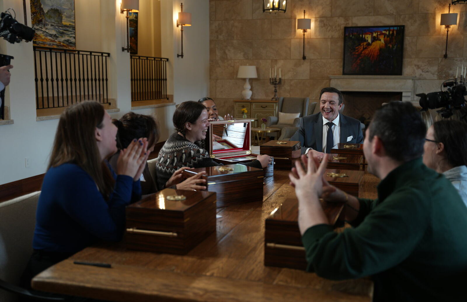 Peter Serafinowicz and Million Dollar Secret contestants at a Chateau Okanagan press and EPK table setup
