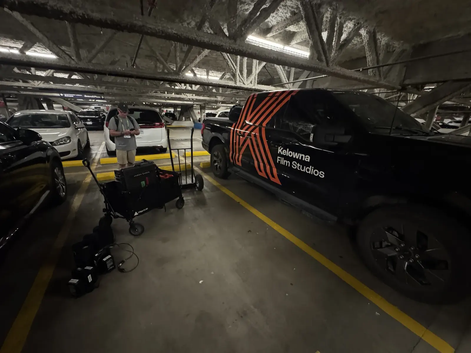 Kelowna Film Studios truck with production gear in a Vancouver parking garage