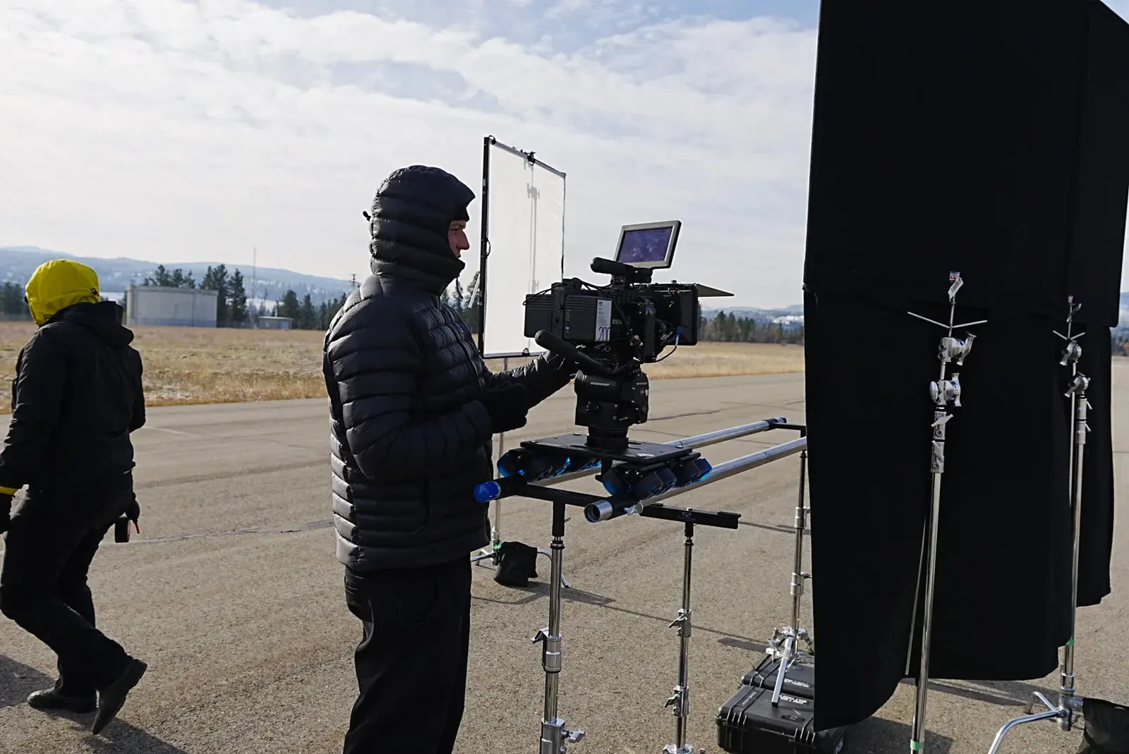 Camera, flags and crew set up on location during the Princeton production