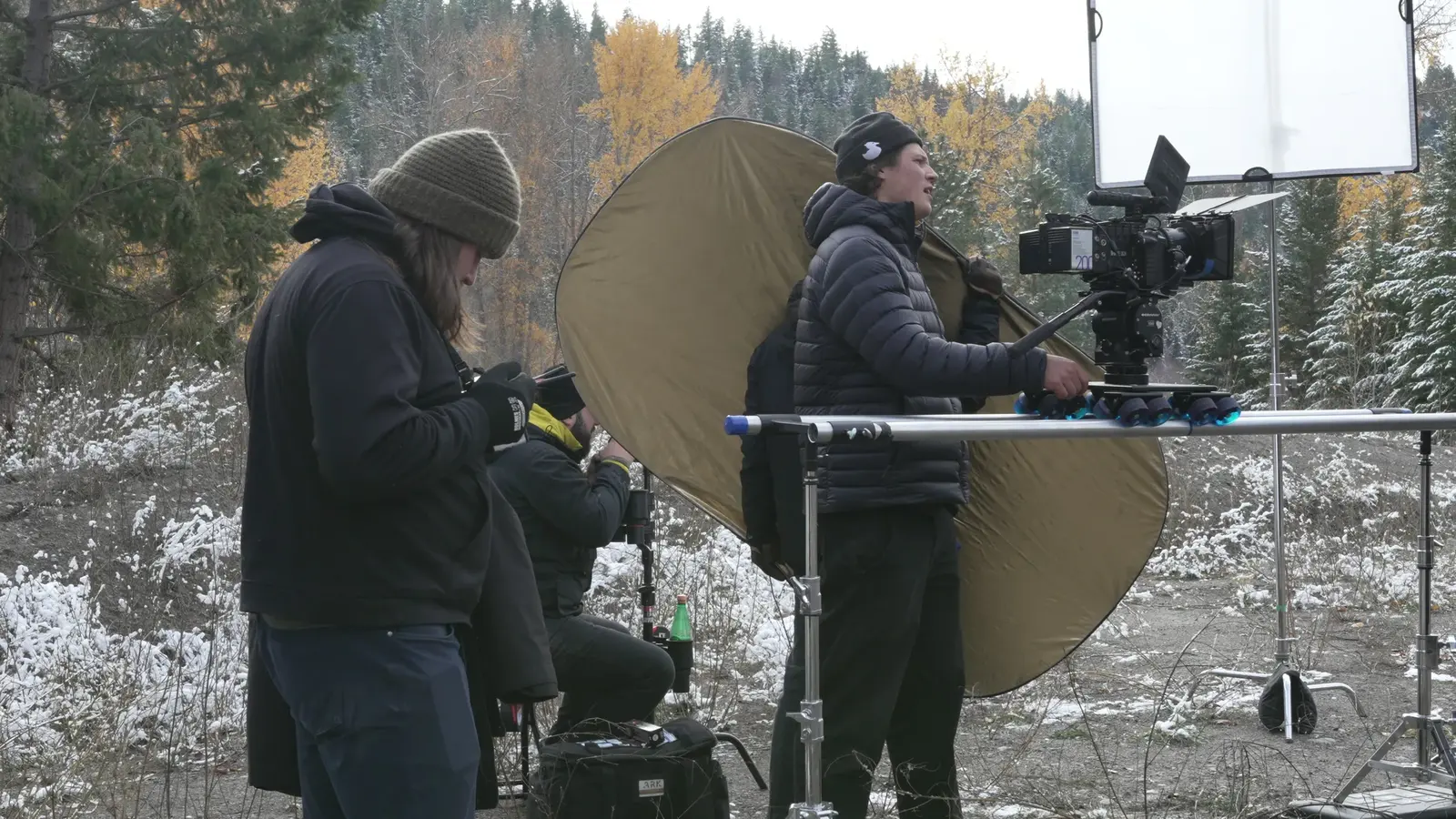 Camera and crew positioned by a river location for the Princeton campaign