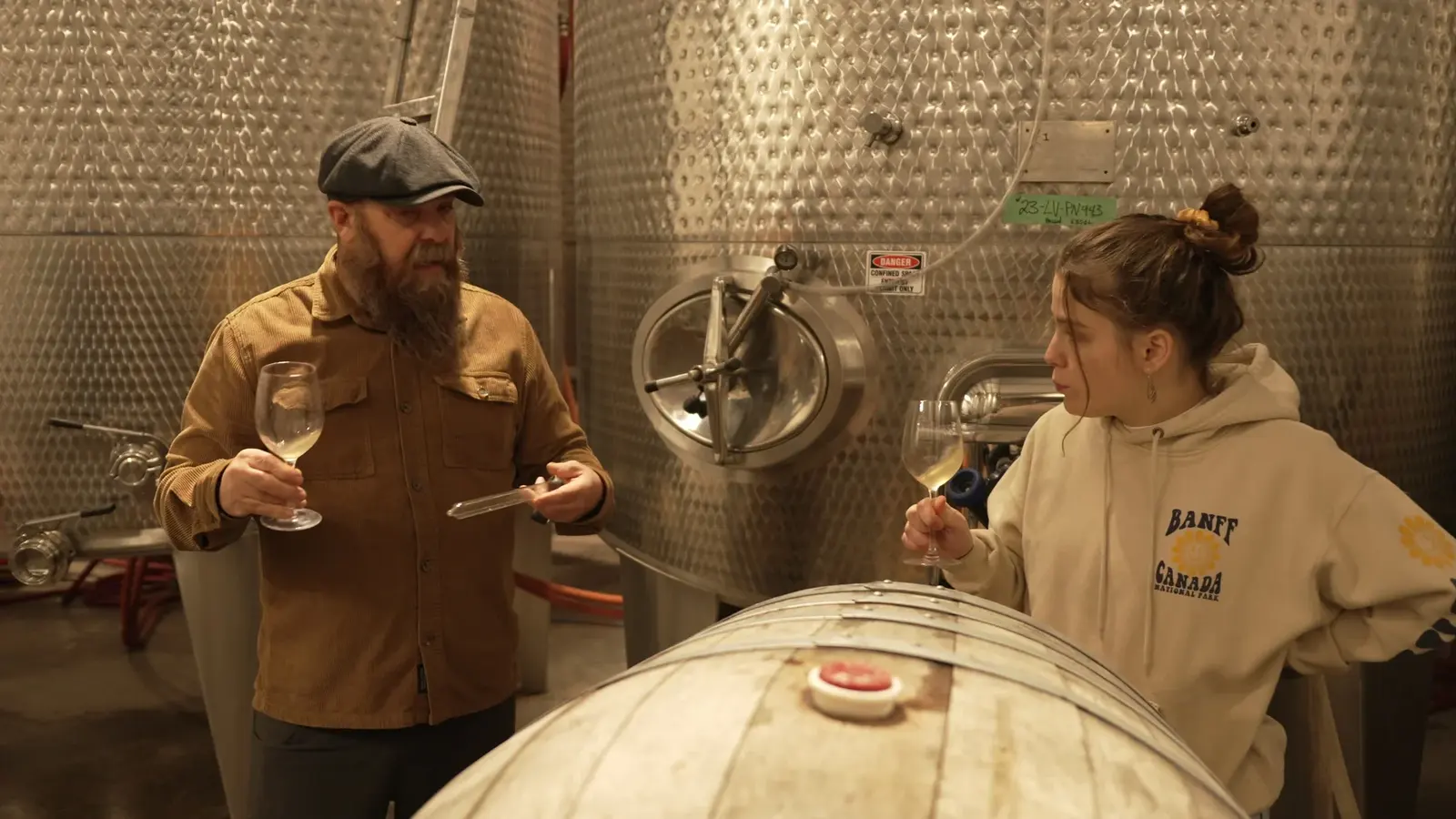 Winery barrel room conversation during Vintage Rebel development footage